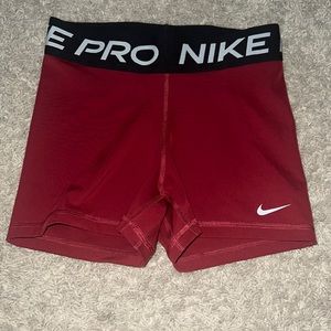 red nike pros